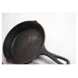 Set of Cast Iron Skillet, Enamel Covered Pot, and Glass Cooking Trays