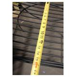 Black Metal Frame Ottoman Bench with Scroll Arm Design