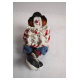 Vintage Porcelain Clown Figurine with Red and Blue Outfit