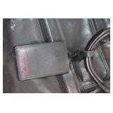 Tumi Genuine Leather Black Briefcase with Multiple Compartments