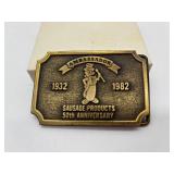 Collection of 2 Vintage Zippo Lighters and Ambassador Hot Dog Belt Buckle