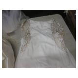 (EW6) 2 Wedding Dresses, 1 Veil and...