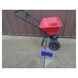 Small poly broadcast spreader. As shown.