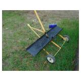 Yard Works dethatcher. As shown.