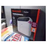 New Honeywell thermal wave electric heater. As shown.