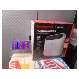 New Honeywell thermal wave electric heater. As shown.