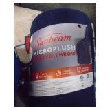 Sunbeam micro plush heated throw & kids sleeping bag. As shown.