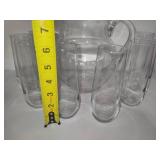 Glass pitcher w/Eight Champagne Glasses