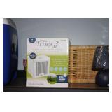 Assorted Home Items Including Books, Bedding, and Appliances