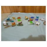 Miniature Animals on Stone Slabs