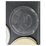 Collection of Kitchen Essentials: Tupperware, Woven Basket and Mat