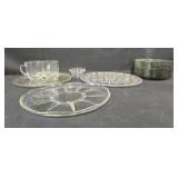 Set of Glass Dinnerware Pieces Including Plates and Mugs