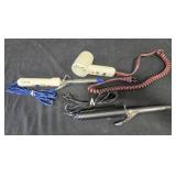 Collection of Vintage Hair Styling Tools including Hair Dryer and Curling Irons