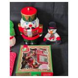 Collection of Christmas Decorations Including Nutcracker and Ornaments