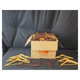 Large Collection of Wooden and Metallic Coat Hangers