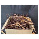 Large Collection of Wooden and Metallic Coat Hangers
