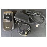 Assorted Office and Household Items Including Paper Trays, Phone, and Lamp