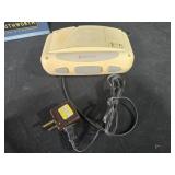 Assorted Office and Household Items Including Paper Trays, Phone, and Lamp