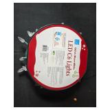 Assorted Holiday Decorations Including Pinecones and LED Lights