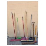 Collection of Assorted Brooms and Yard Tools