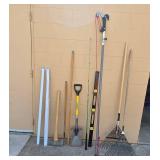 Collection of Yard and Garden Tools Including Rakes, Shovel, and Pole Pruner