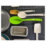 Assorted Kitchenware Collection with Pans, Utensils, and Bakeware