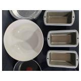 Assorted Kitchenware Collection with Pans, Utensils, and Bakeware