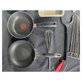 Assorted Kitchenware Collection with Pans, Utensils, and Bakeware