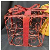 Holiday Decor Collection: Stuffed Bunny, Gingerbread Pans, Red Gift Box Wire Frame, and Poinsettia Arrangement