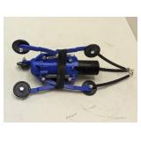 Self-adjusting and centering camera mount for inspecting pipe