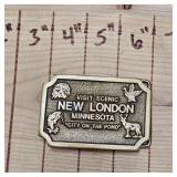 New London Frontier and Eradicane Belt Buckle