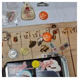 Collection of Pins and Halverson Coop Clipboard