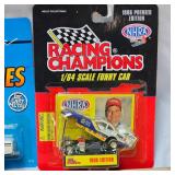 Yellow Transit Die Cast 1:64 scale and Ertl Case Truck