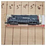 Yellow Transit Die Cast 1:64 scale and Ertl Case Truck