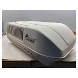 ATWOOD ROOFTOP RV AC W/ HEAT PUMP.
