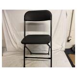 2 Black Plastic Folding Chairs