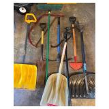 Collection of Lawn and Garden Tools with Large Blue Barrel