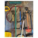 Collection of Lawn and Garden Tools with Large Blue Barrel