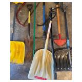 Collection of Lawn and Garden Tools with Large Blue Barrel