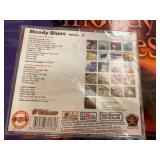 The Moody Blues Memorabilia & Brown & Bigelow Prints Lot - CD, Calendar, Photo Book & More