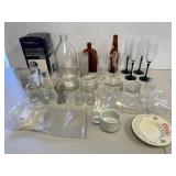 Diverse Glassware Collection with Vintage and Storage Pieces