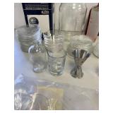 Diverse Glassware Collection with Vintage and Storage Pieces