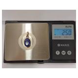 Sterling Silver Pendant with Blue Stone