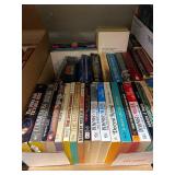 Diverse Collection of Paperback Books by Various Authors