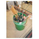 Ice Fishing Poles and Tip-ups in Bucket