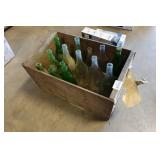 Wooden Crate with Assorted Glass Bottles