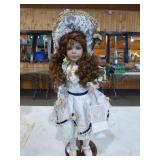 3 Porcelain Dolls on Stands