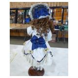 3 Porcelain Dolls on Stands