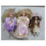 3 Porcelain Dolls on Stands
