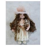 3 Porcelain Dolls on Stands